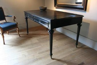 A smart C19th French ebonised bureau plat