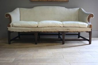 A superb late C19th English camel back sofa