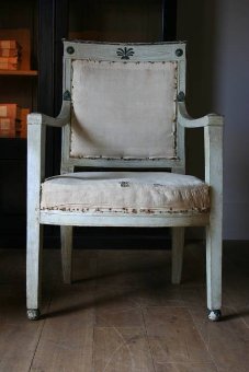 A superb pair of French Empire period painted armchairs