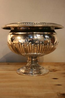An antique rose bowlwine cooler in classic style