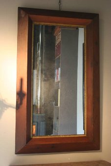 An unusual C19th French bolection mould framed mirror