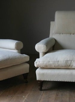 An unusual pair of C19th easy chairs