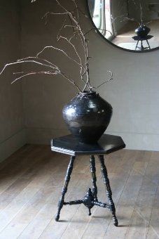 A late C19th Aesthetic movement ebonised and parcel gilt table