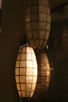 A pair of 1950s mother of pearl hanging lights