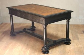 A C19th French ebonised bureau plat