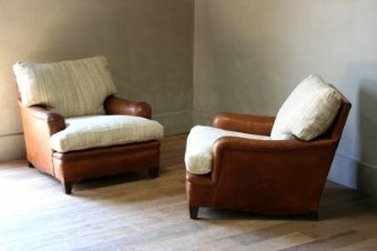 A pair of 1930s Spanish leather club chairs