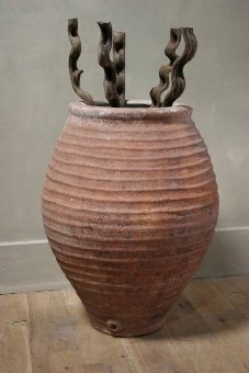 A large early C19th Spanish terracotta pot