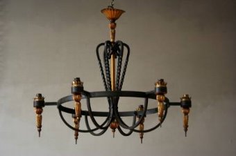 A 1950s iron and gilt chandelier