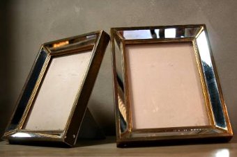 A pair of 1930s mirrored picture frames