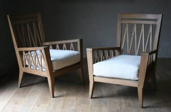 A suite of 4 1950s French oak easy chairs