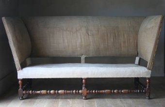 A fantastic early wing sofa