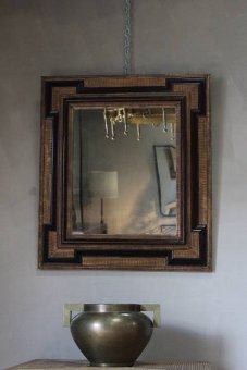 An unusual C19th parcel gilt mirror