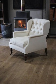 A shapely C19th English libraryeasy chair