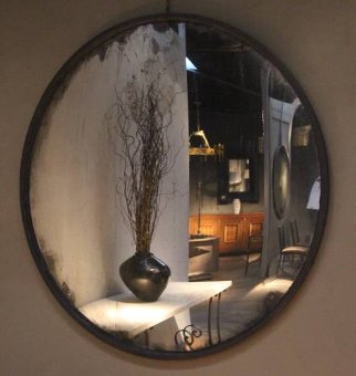 A huge early C20th convex mirror