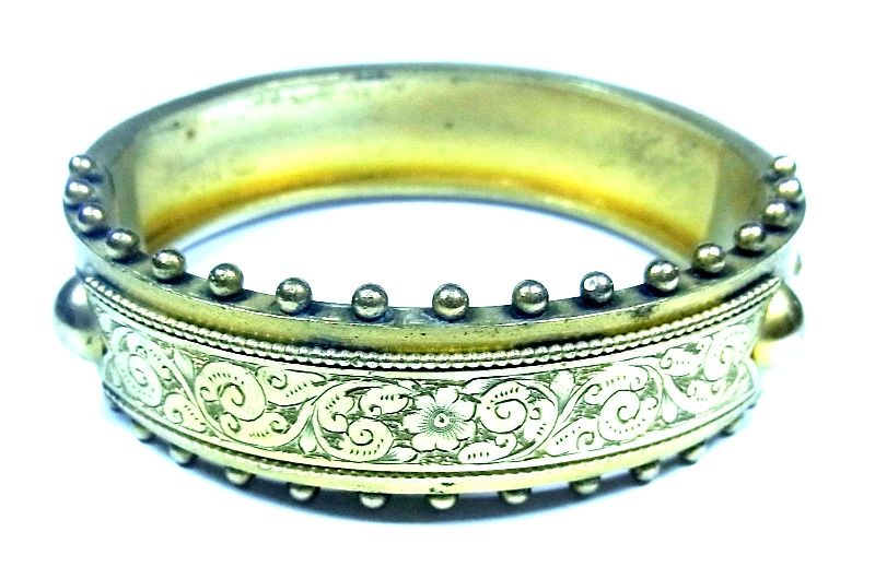 N523A Victorian gilt-metal engraved bangle
