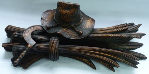 ANTIQUE LATE-19TH CENTURY BLACK FOREST INKWELL - LARGE WHEATSHEAF, HAT & SICKLE