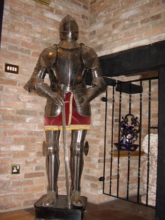 A FULL SUIT OF  ANTIQUE ARMOUR WITH FULLY ARTICULATED JOINTS MOUNTED ON WOODEN FRAME & BASE STAND...