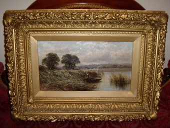 VICTORIAN OIL ON CANVAS OF THE NORFOLK BROADS SIGNED E BAKER PUNTING ONE OF A PAIR