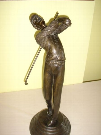 BRONZE GOLFER IN FULL SWING C1920 