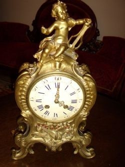 C1800-1860 A FINE LOUIS STYLE GILT BRONZE CHERUB MANTLE CLOCK BY GAY VICARINO & CO PARIS 