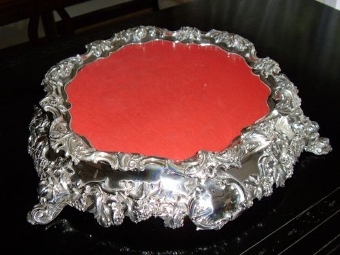 SILVER PLATED STAND ENCRUSTED WITH ORNATE GRAPES & LEAVES WITH THREE FEET  C1900-1910 & 19