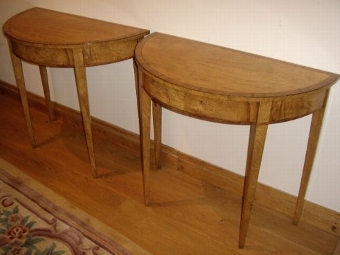 A PAIR OF FINE REGENCY DESIGN DEMI-LUNE CONSOLE TABLES VENEERED IN FINELY CRAFTED YEW,SATINWOOD,M...