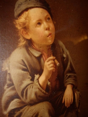 VICTORIAN OILEOGRAPH OF A YOUNG WORKING BOY TAKING A REST ON A PINE BOX & SMOKING A LARGE CIGAR C...