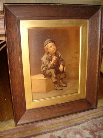 Antique VICTORIAN OILEOGRAPH OF A YOUNG WORKING BOY TAKING A REST ON A PINE BOX & SMOKING A LARGE CIGAR C1873 