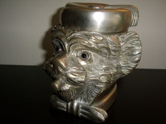 Antique MONKEY HEAD TOBACCO JAR WITH  HINGED LID IN THE FORM OF A  FEZ CAP & BEING  HAND CRAFTED FROM HIGHLY POLISHED FAUX SILVER METAL ALLOYS &  MEASURING 6.5 INCHES HIGH 