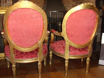Antique PAIR OF GILT DECORATIVELY CARVED WOODEN SALON ARMCHAIRS IN EARLY FLORREL WINE EARLY UPHOLSTERY & DATING EARLY 19TH CENTURY (1810-40) UNIQUE ITEMS
