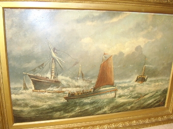 Antique VICTORIAN 19TH CENTURY MARINE OIL PAINTING ON ARTISTS BOARD AFTER WILLIAM BROOMES ORIGINAL OF THE RAMSGATE LIFEBOAT RESCUE OF THE VESSEL CALLED THE INDIAN CHIEF & PRESENTED IN THE ORIGINAL DECORATIVE FRAME WITH MONOGRAMMED INITIALS 