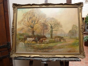 FINE OIL PAINTING ON PANEL OF CATTLE WATERING BESIDES A FLOODED DIRT TRACK BY LISTED ARTIST RICHA...