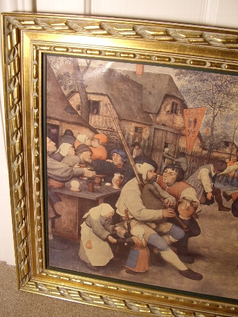 Antique OILEOGRAPH PRINT ON CANVAS OF DUTCH TAVERN SCENE DEPICTING A 17TH CENTURY GENRE SCENE IN HEAVY CARVED WOODEN GILT FRAME