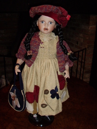 QUALITY HAND MADE PORCELAIN COLLECTORS  DOLL HOLDING BAG  28 INCHES HIGH