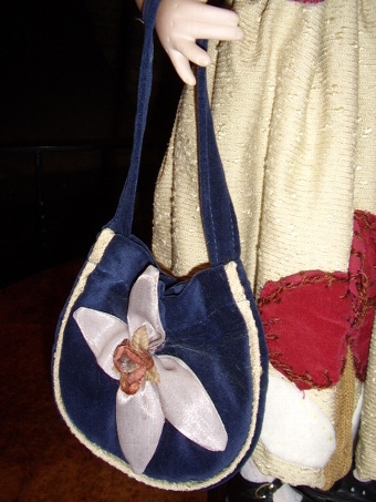 Antique QUALITY HAND MADE PORCELAIN COLLECTORS  DOLL HOLDING BAG  28 INCHES HIGH