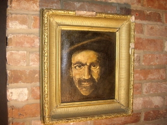 AN EARLY 18th. CENTURY OIL ON CANVAS STUDY OF A PEASANT IN GILT FRAME  17 X 15 INCHES