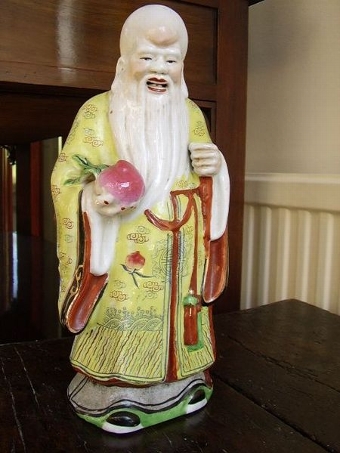 ENAMEL GLAZED ORIENTAL OLD MAN HOLDING APPLE C1900-20