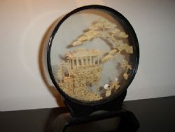 HAND CRAFTED CORK CARVING DEPICTING ORIENTAL HOUSE WITH TREES & BIRDS IN GLASS CASE ON STAND