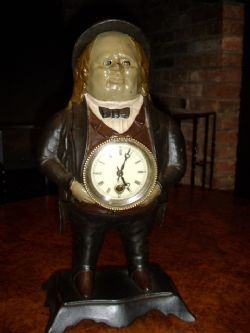 NOVALTY CAST METAL PAINTED FIGURINE CLOCK WITH MOVING EYES BY BRADLEY & HUBBARD C1920 