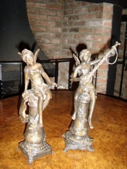 PAIR OF BRONZE ART NOVEAU BOY & GIRL ANGELS SITTING ON PLILLARS ONE PLAYING AN INSTRUMENT TO THE ...
