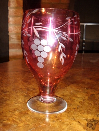 Antique CRANBERRY GLASS DECANTER SET WITH FOUR GLASSES HAVING ETCHED DESIGN 