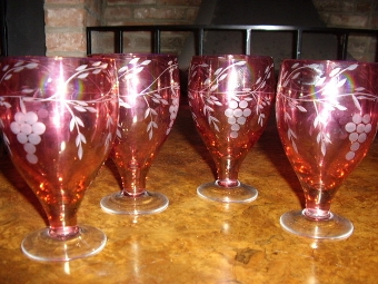Antique CRANBERRY GLASS DECANTER SET WITH FOUR GLASSES HAVING ETCHED DESIGN 