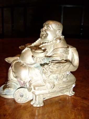 Antique FAUX SILVER BUDDHA SITTING WITH BROAD SMILE