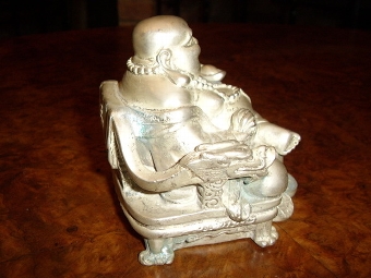 Antique FAUX SILVER BUDDHA SITTING WITH BROAD SMILE