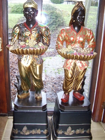 PAIR ART DECO VENETIAN BLACKAMOORS IN CARVED GILT WOOD HOLDING CARVED SHELLS.  