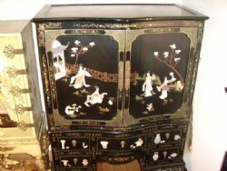 ORIENTAL PAINTED CABINET WITH CARVED SOAPSTONE DECORATION. 
