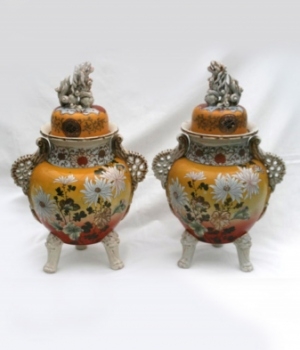 A fabulous pair of Japanese Kutani lidded vases