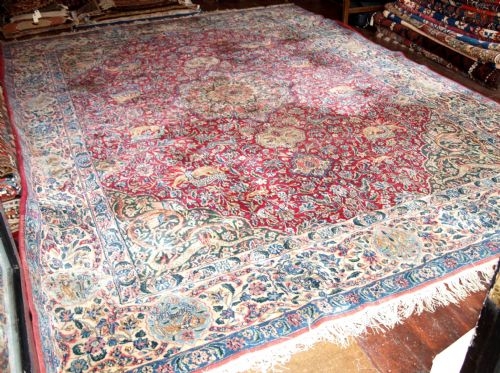 OLD PERSIAN KIRMAN HUNTING DESIGN CARPET, CIRCA 1920