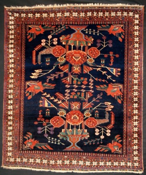 ANTIQUE PERSIAN AFSHAR RUG, VASE DESIGN, CIRCA 1920.