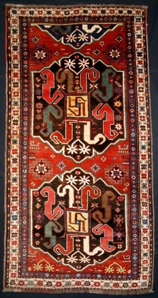 ANTIQUE CAUCASIAN CLOUDBAND RUG, CIRCA 1900.